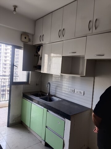 Kitchen in 3 BHK Apartment at Gulshan Bellina, Sector 16 Greater Noida – for Rent