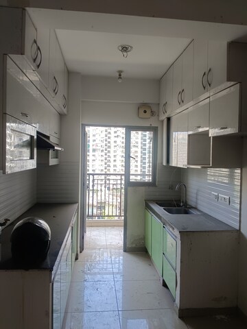 Kitchen in 3 BHK Apartment at Gulshan Bellina, Sector 16 Greater Noida – for Rent