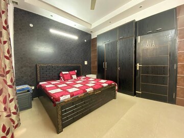 Bedroom in 4 BHK Builder Floor at Ansal Sushant Lok I, Sector 43 – for Rent