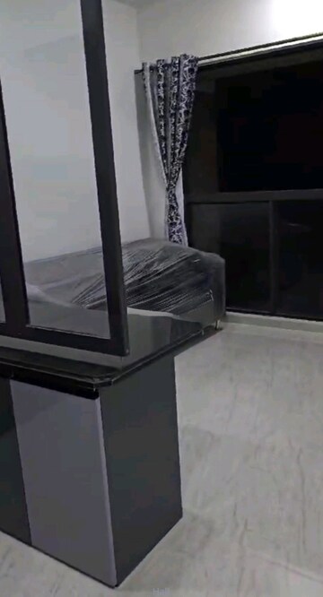 Living Room in 1 BHK Apartment at Lodha Crown Quality Homes, Majiwada – for Rent