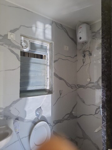 Bathroom in 1 BHK Apartment at Raunak Bliss, Ghodbunder Road – for Rent