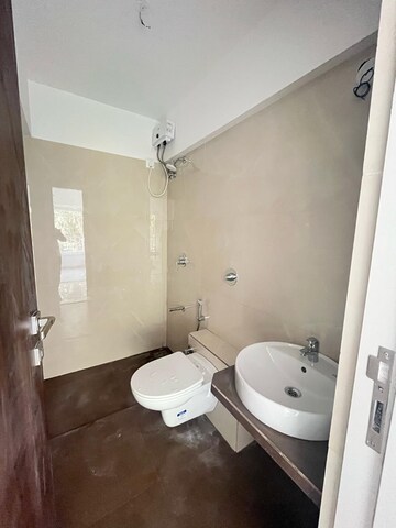 Bathroom in 1.5 BHK Builder Floor at Parsh 66 Avenue, Borivali East – for Rent