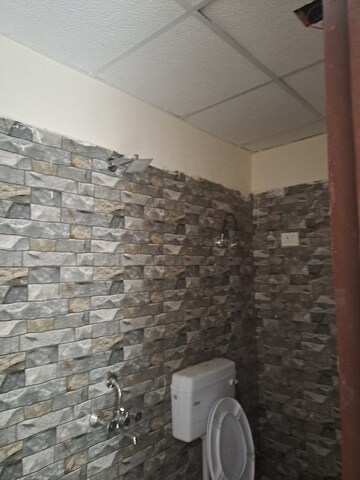 Bathroom in 1 BHK Apartment at Kritak Modern Apartments, Sector 73 – for Sale