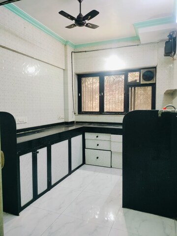 Kitchen in 1 RK Apartment at Ajit Park CHS, Malad West – for Rent