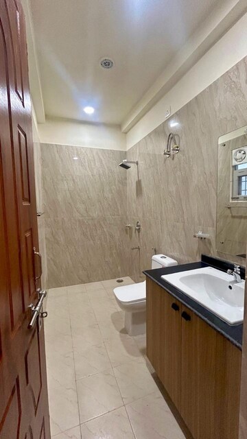 Bathroom in 2 BHK Apartment at Ansal Sushant Golf city, Sushant Golf City – for Rent
