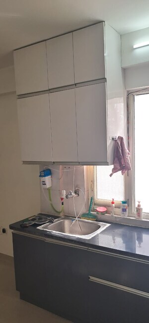 Kitchen in 3 BHK Apartment at ROF Aalayas, Sector 102 – for Sale