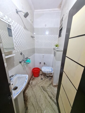 Bathroom in 3 BHK Builder Floor at Dwarka Mor – for Rent