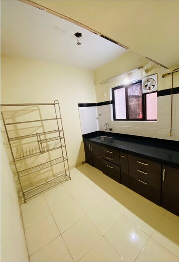 Kitchen in 2 BHK Apartment at Sunshree Gold, Nibm Road – for Rent
