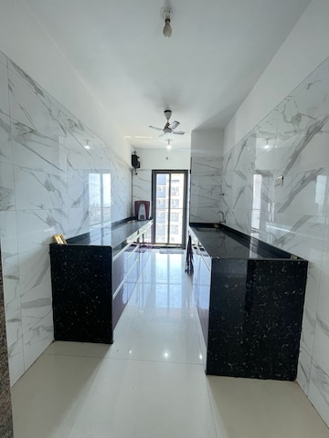 Kitchen in 3 BHK Apartment at Neminath Luxeria, Andheri West – for Rent