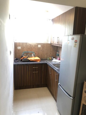 Kitchen in 3 BHK Apartment at Oxirich Avenue, Ahinsa Khand 2 – for Sale