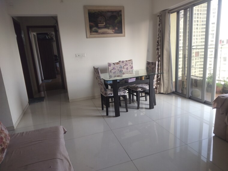 Living Room, amanora-adreno-towers 2 Bedroom 808 Sq.Ft. Apartment In Hadapsar Pune 8602802