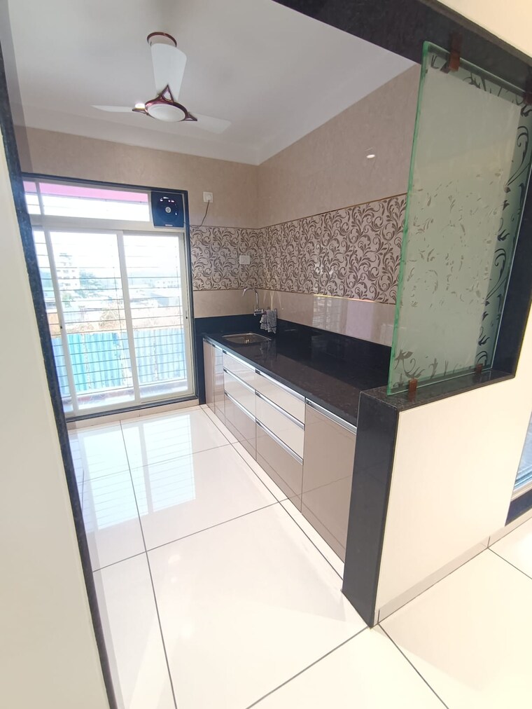 Kitchen, om-arcade-titwala 2 Bedroom 1000 Sq.Ft. Apartment In Titwala Thane 8602809