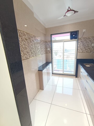Kitchen in 2 BHK Apartment at Om Arcade Titwala, Titwala – for Sale