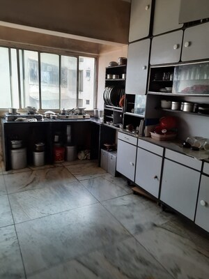 Kitchen in 6 BHK Apartment at Santosh Tower, Andheri West – for Sale