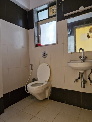 Bathroom in 2 BHK Apartment at Rashi Tower, Goregaon East – for Rent