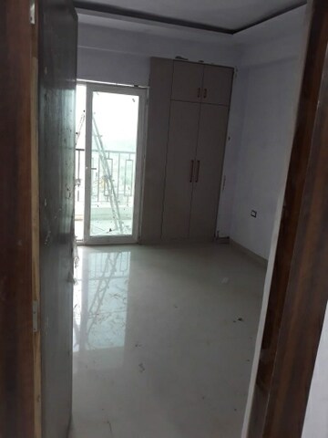 Room in 2 BHK Apartment at Charms Castle, Raj Nagar Extension – for Rent