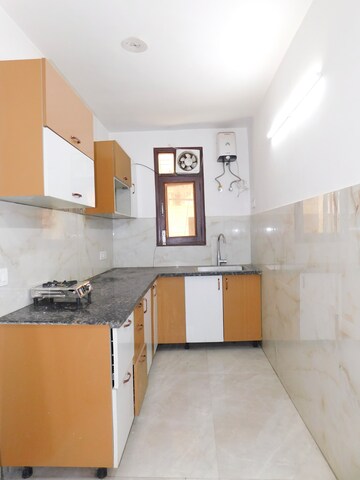 Kitchen in 2 BHK Builder Floor at Khirki Extension – for Rent