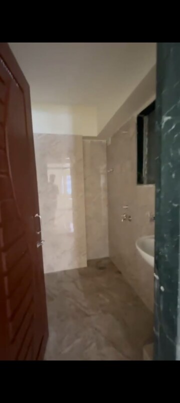 Bathroom in 1 BHK Apartment at Lodha Palava Downtown, Dombivli East – for Rent