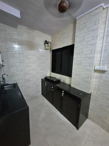 Kitchen in 1 BHK Apartment at Mahesh Apartment Ghansoli, Ghansoli – for Rent