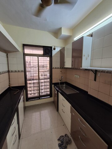Kitchen in 1 BHK Apartment at Mahesh Apartment Ghansoli, Ghansoli – for Rent