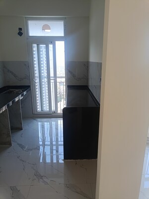 Kitchen in 2 BHK Apartment at Ruparel Sky Green, Kandivali West – for Sale
