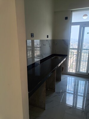 Kitchen in 2 BHK Apartment at Ruparel Sky Green, Kandivali West – for Sale