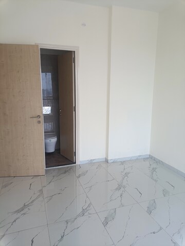 Room in 2 BHK Apartment at Ruparel Sky Green, Kandivali West – for Sale