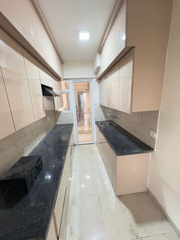 Kitchen in 2.5 BHK Apartment at Signature The Millennia 2, Sector 37d – for Rent