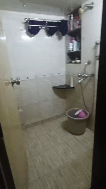 Bathroom in 1.5 BHK Apartment at Hilton Tower, Andheri East – for Rent