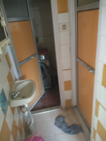 Bathroom in 1 BHK Apartment at Brahmand – for Sale