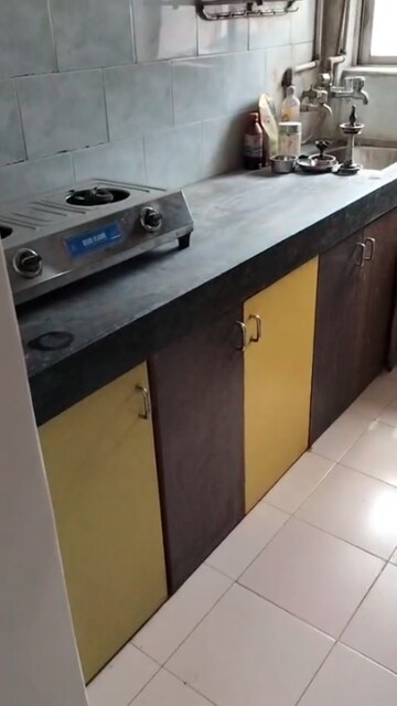 Kitchen in 1 BHK Apartment at Brahmand – for Sale