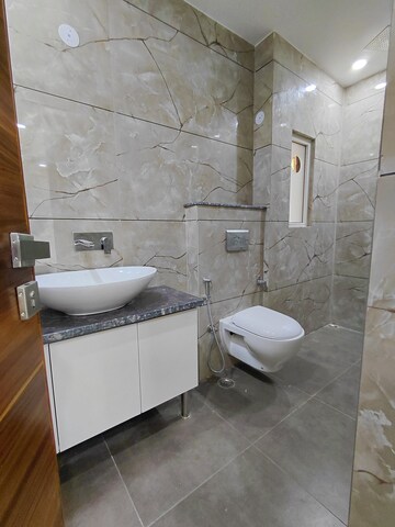 Bathroom in 3 BHK Apartment at Janakpuri – for Sale