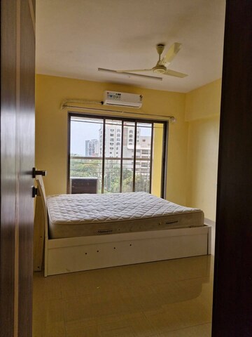 Bedroom in 2 BHK Apartment at Rashi Tower, Goregaon East – for Rent