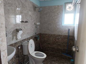 Bathroom in 2 BHK Apartment at Wall Rock Aishwaryam, Sector 16c Greater Noida – for Sale