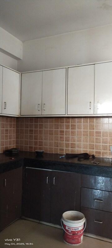 Kitchen in 3 BHK Apartment at Mahagun Mywoods, Sector 16c Greater Noida – for Rent