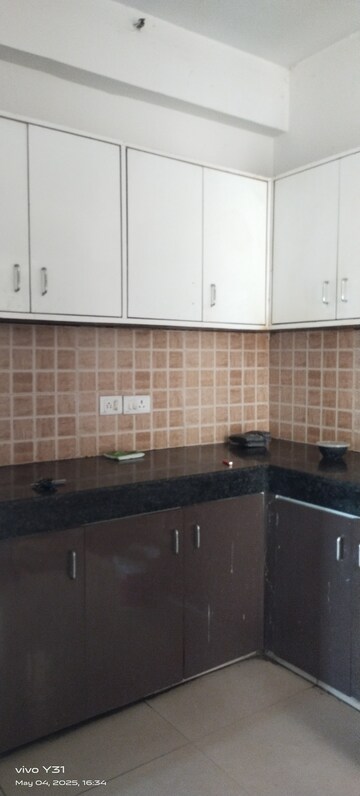 Kitchen in 3 BHK Apartment at Mahagun Mywoods, Sector 16c Greater Noida – for Rent