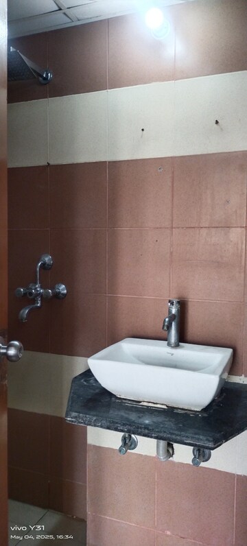 Bathroom in 3 BHK Apartment at Mahagun Mywoods, Sector 16c Greater Noida – for Rent