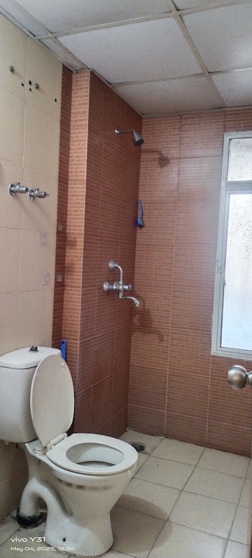 Bathroom in 3 BHK Apartment at Mahagun Mywoods, Sector 16c Greater Noida – for Rent