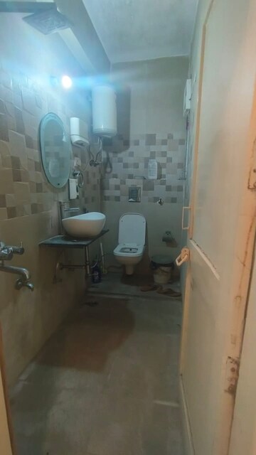 Bathroom in 2 BHK Apartment at Karthik Apartment, Sector 21c – for Rent