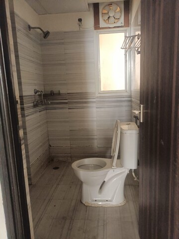 Bathroom in 3 BHK Apartment at Kbnows Apartment, Sector 16 Greater Noida – for Rent