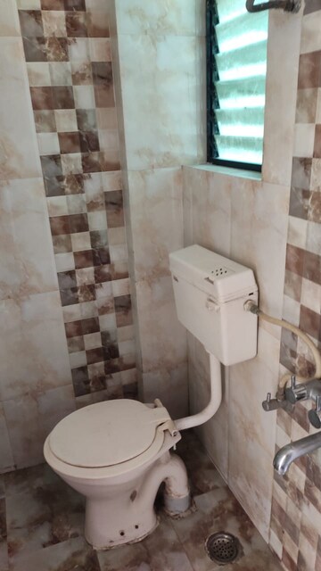 Bathroom in 2 BHK Apartment at Vision Shubh Mangalam, Wakad – for Rent