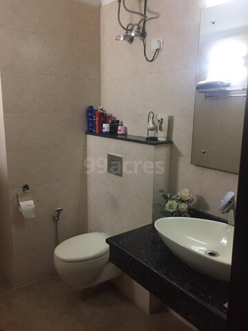 Bathroom in 1 BHK Apartment at Unitech Uniworld Gardens 2, Sector 47 – for Sale