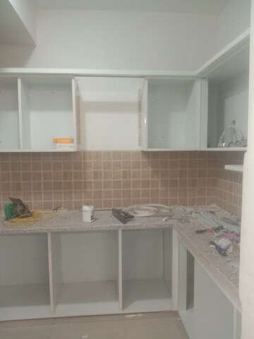 Kitchen in 3 BHK Apartment at Mahagun Mywoods, Sector 16c Greater Noida – for Rent