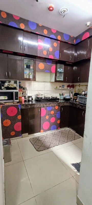 Kitchen in 2 BHK Apartment at Ajnara Le Garden, Sector 16b Greater Noida – for Rent