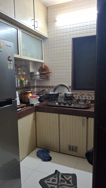 Kitchen in 2 BHK Apartment at Regency Estate, Dombivli East – for Rent