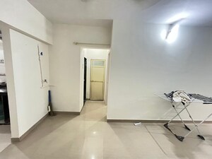 Room in 2 BHK Apartment at Dev Leo Tower, Oshiwara – for Sale
