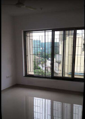 Room in 2 BHK Apartment at Sheth Vasant Athena, Laxmi Nagar – for Rent