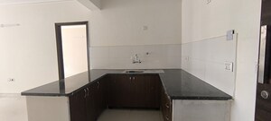 Kitchen in 1 BHK Apartment at Cosmos Express 99, Sector 99 – for Sale