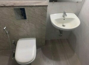 Bathroom in 2 BHK Apartment at Regency Towers, Kavesar – for Sale