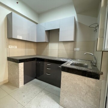 Kitchen in 2 BHK Apartment at Tata Eureka Park, Sector 150 – for Rent